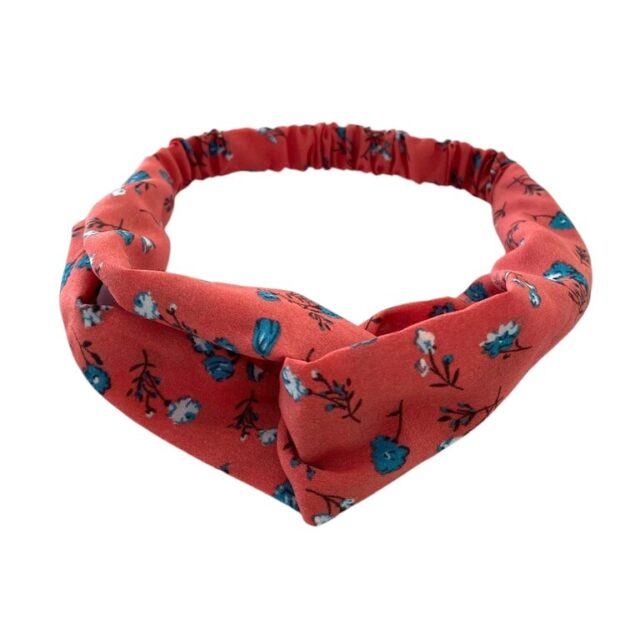 Bandeau croisé corail, petites fleurs bleues